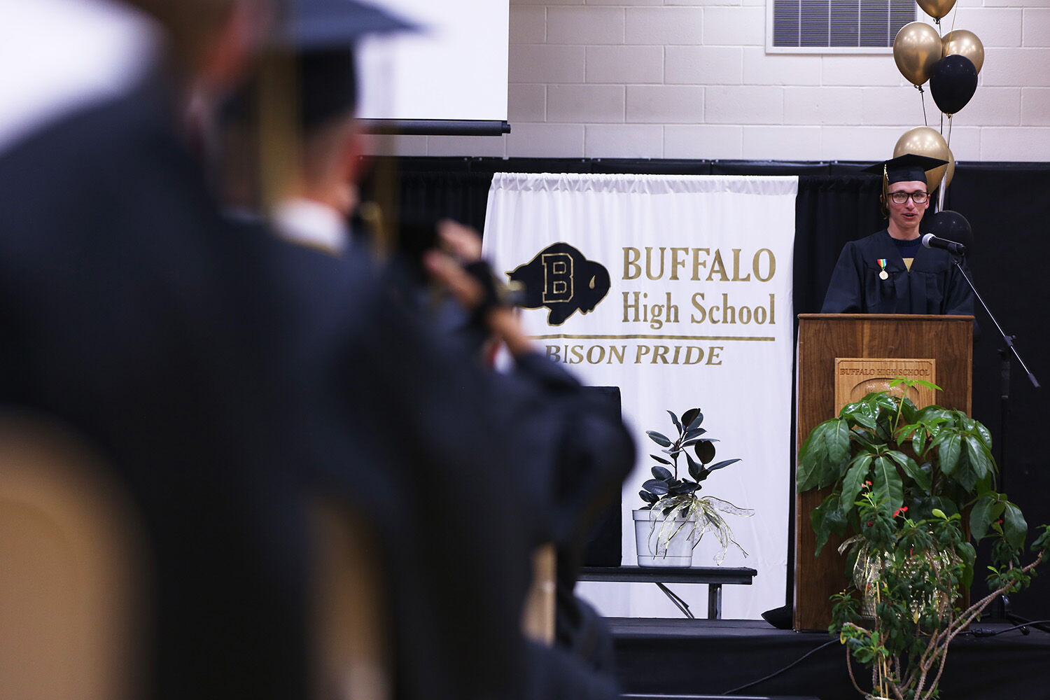 Tim Clason introduces commencement speaker Dick Edgcomb